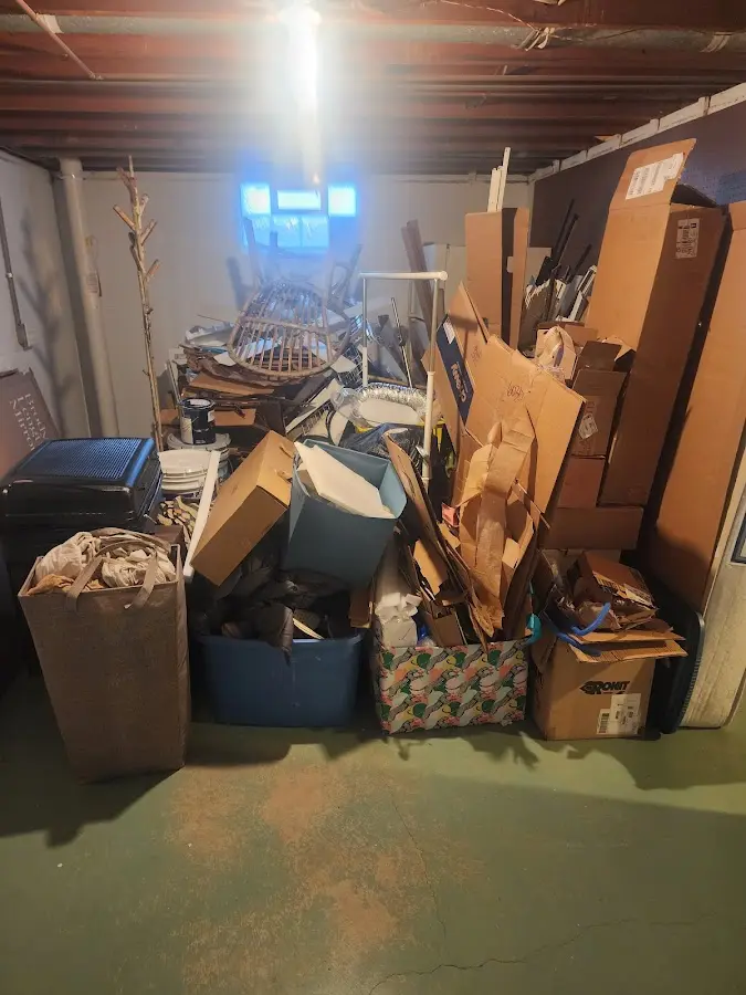 Roll-off dumpster container at job site for 6 Yard Dumpster Rental in Wallace